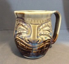 Cup w/ carved Tiki