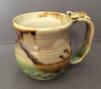 Cup w/turtle on the handle 